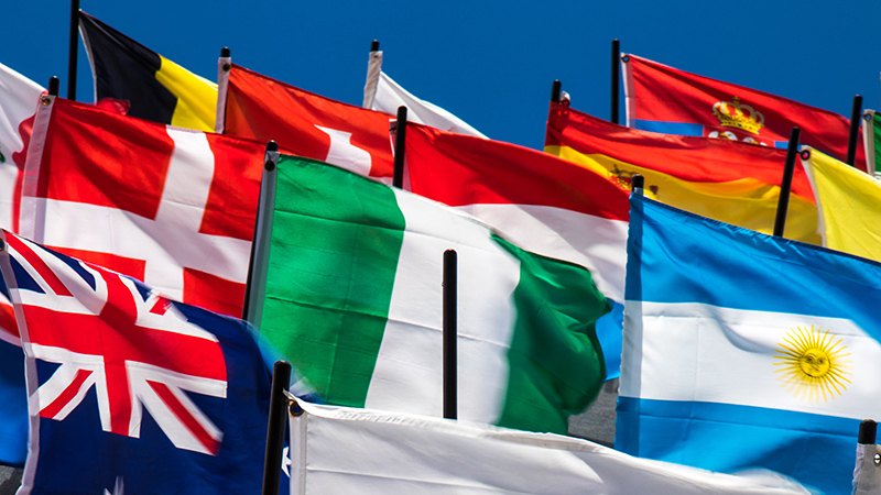 Flags on a blue sky background.